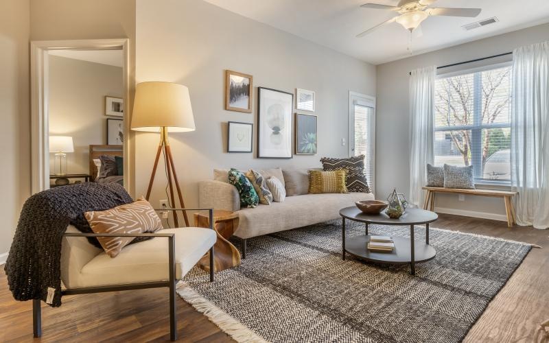 a living room with a chair and a couch