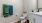 a bathroom with a toilet and towels