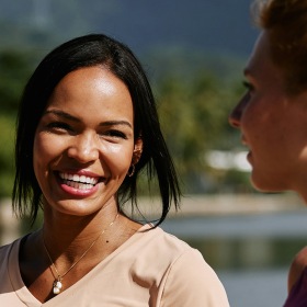 Settle into comfort at Galleria Village a woman smiling at another